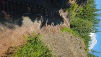 FPV drone is flying fast forward over railway track. Canada video