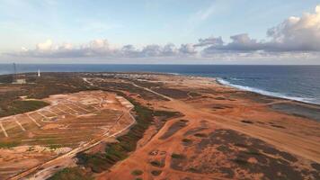 Aerial view around the western tip of the Caribbean island of Aruba video