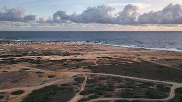 Aerial view around the western tip of the Caribbean island of Aruba video
