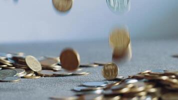Lot of coins in the hands of men. Slow motion video