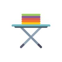 Stack of colorful clothes sitting on an ironing board vector
