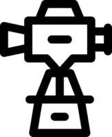 A black and white icon of a camera vector