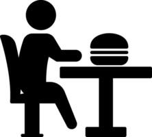 A black and white silhouette of a person sitting at a table with a hamburger vector