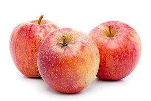 Three ripe red apples with stems lying on white background photo