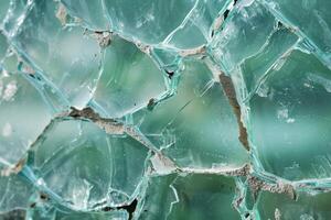 Broken safety glass showing abstract pattern of cracks photo