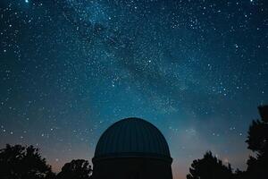 Astronomical observatory under a magnificent starry sky showing the milky way photo
