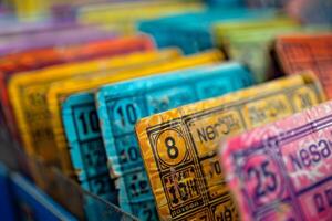 Colorful vintage bus tickets showing numbers in rows are being collected photo