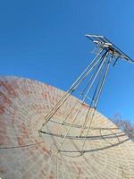 Close-up of old radio telescope, used to study centimeter range of radio waves photo
