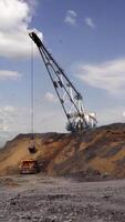 Heavy Machinery Used in OpenPit Mining Operations for Extracting Valuable Minerals and Resources. Stock Clip video