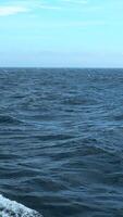 Waves from floating sea vessel. Clip. Beautiful moving waves from floating ship at sea. Beautiful sea horizon with moving waves from ship video