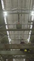 This is an Industrial Facility featuring Overhead Cranes and Modern Lighting Systems. Stock Clip video