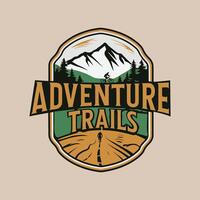 Adventure Trails Logo design with mountains and trees vector