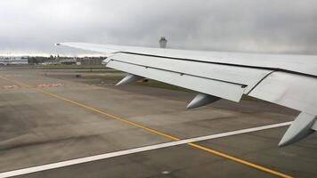 Airplane Wing During the Process of Landing on a Cloudy and Overcast Day in the Sky video
