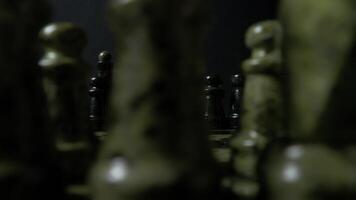 Engaging in a strategic chess game that features abstract pieces with a notable focus video