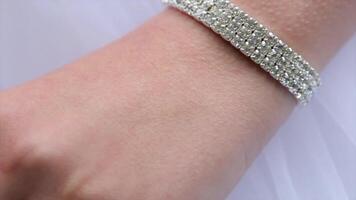 An Elegant Wrist That Is Beautifully Adorned with a Sparkling Bracelet That Shines video
