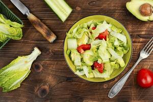 Spring salad of raw fresh vegetables. photo