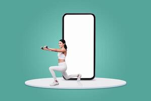 A woman in activewear performs a lunge with dumbbells while facing a large blank mobile device. The setting is bright and modern, showcasing a focus on fitness and technology. photo