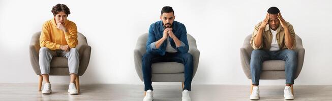 Collage Of Three Different Pensive Men Sitting On Chair Over White Wall Indoors, Young Upset Multiethnic Males Thinking About Something, Suffering Depression Or Life Problems, Panorama photo
