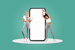Two women are engaged in stretching and fitness activities near a giant smartphone. They wear workout attire and appear motivated in a vibrant, cheerful environment. photo