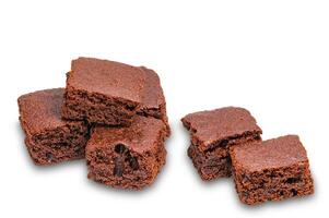 High angle view pile of sweet crispy brownie chocolate cube isolated on white background with clipping path. photo