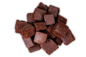 Top view pile of sweet crispy brownie chocolate cube isolated on white background with clipping path. photo