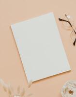 Empty blank white magazine or catalog cover layout, vase, glasses and white crystal photo