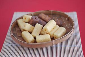 Crispy fried breadcrumbs in bamboo basket background photo