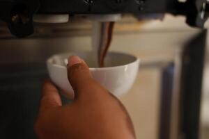 Pouring a Fresh Cup of ice cream chocolate photo