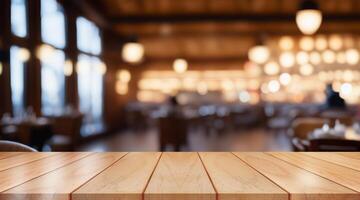 Empty wooden table top with lights bokeh on blur restaurant background. photo