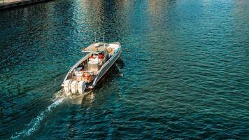The yacht sails along the canal photo