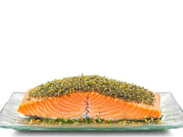 Baked salmon with a herb crust lemon slices on the side on a transparent rectangular png