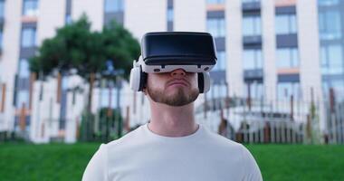 A man wearing a virtual reality headset video