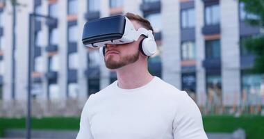 A man wearing a virtual reality headset video
