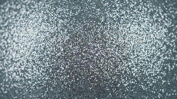 A close up of a black surface with white glitter video