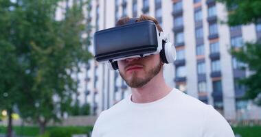 A man wearing a virtual reality headset video