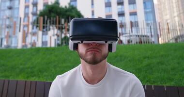A man wearing a virtual reality headset video
