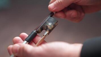 A person is holding a pair of scissors video