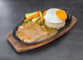Pork Chop with Gravy and Rice, a hearty and satisfying Filipino dish photo