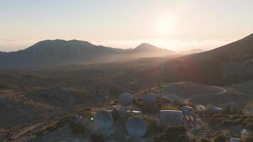 An aerial view of a mountain range with some antennas video