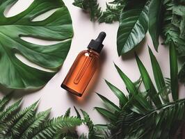 Essential Oil Bottle Surrounded by Lush Greenery photo