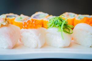 A plate with sushi rolls on it photo