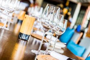 A table with empty wine glasses on it photo