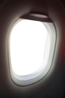 Big passenger plane window with white isolate view. photo