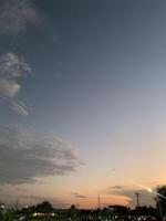 The evening sky was so peaceful and relaxed at the park. photo