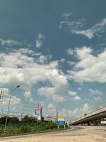 Road and traffic conditions under bridge photo