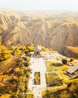 Aerial top view The Temple of Garni and autumn. It is a pagan temple in Armenia was built in the first century AD by the Armenian king Trdat. photo