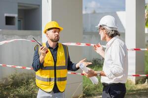 Senior officer male argue complain blame to construction engineer foreman for bad construction low quality project fail not pass standard problems photo