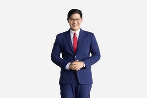 Reception Asian model isolated on white background. Receptionist male in business suit expression standing welcome smile photo