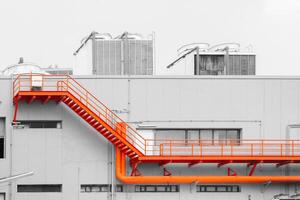 exterior industry building maintenance service walking space stair way for service or emergency exit with cooling tower at roof top photo