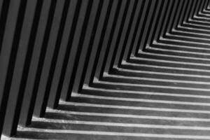 Light and shadow line corner art wallpaper diagonal strips. Geometric diagonal pattern of shadow on roughness shingles black texture photo